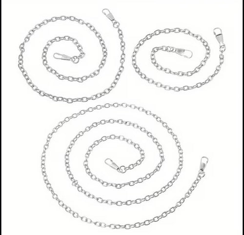 Three silver metal link chains with lobster clasp ends, arranged in loose spiral shapes on a plain white background.