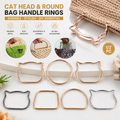Six metal cat-shaped bag handle rings in gold, rose gold, silver, and bronze finishes are displayed on a white surface with a woven bag handle example and product feature icons. Text reads 'CAT HEAD & ROUND BAG HANDLE RINGS' and '1/2 PC'.