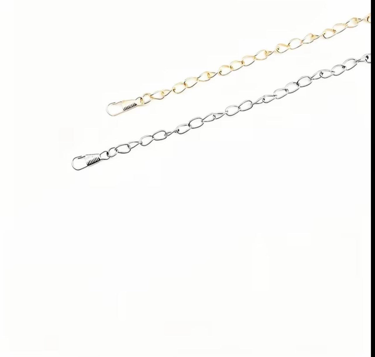 Two metal chain extensions with spring clips, one in gold-tone and one in silver-tone, shown on a plain white background.