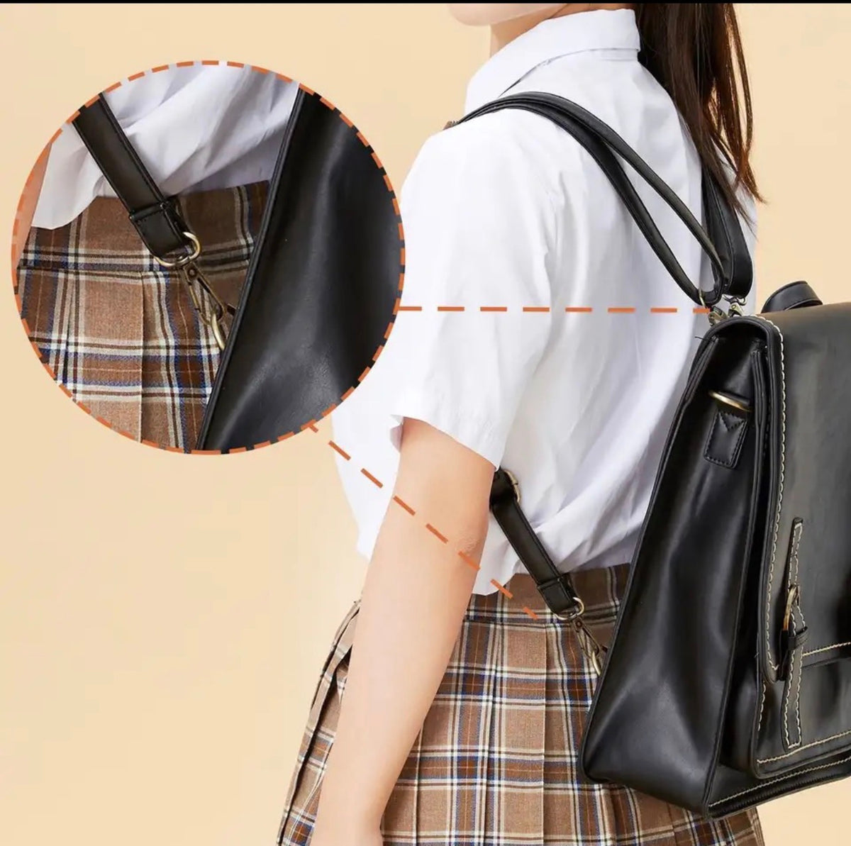 A black faux-leather backpack shown on a model wearing a white shirt and plaid skirt, with an inset close-up of the bag's strap and hardware detail.