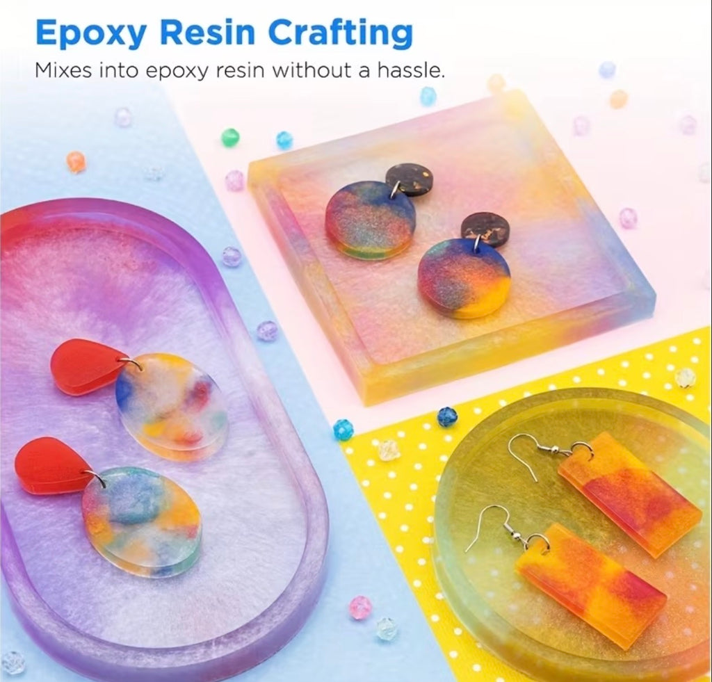 Epoxy resin crafting promotional graphic showing colorful handmade earrings displayed on trays and a square resin block. Text at the top reads 'Epoxy Resin Crafting' and 'Mixes into epoxy resin without a hassle.